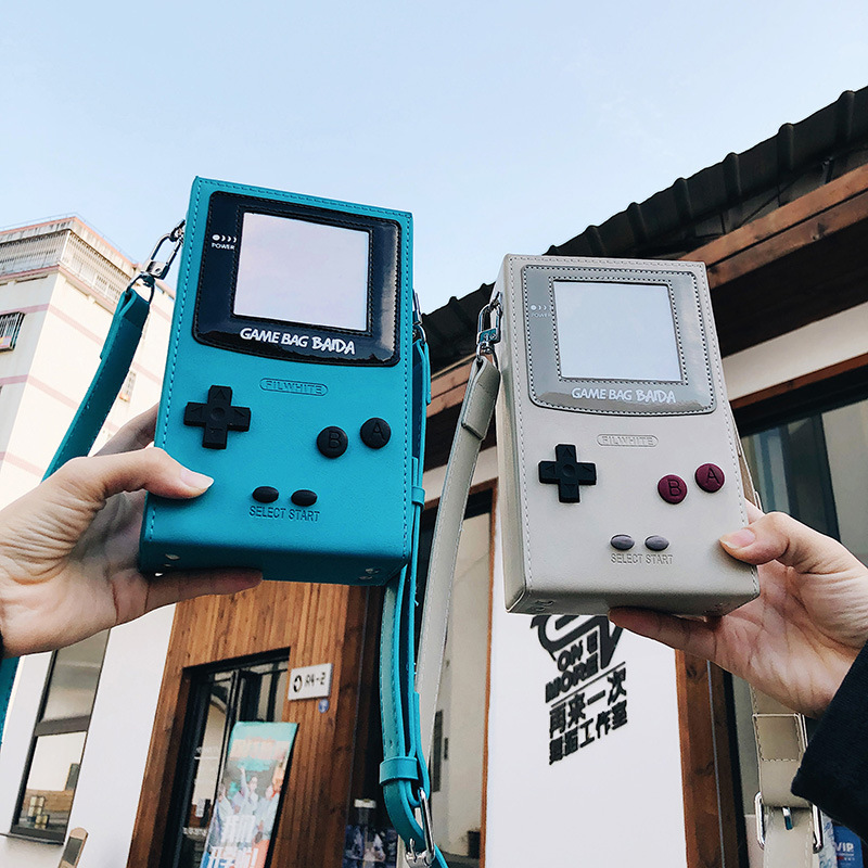 Retro Gaming Events - حقيبة كتف صغيرة بتصميم وحدة تحكم
